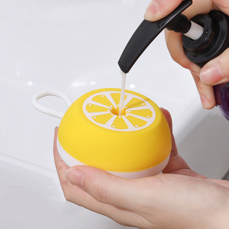 Silicone pet bath and massage brush in use